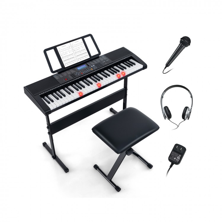 61-key portable electronic keyboard piano set with stand, stool, microphone, and headphones for versatile music.