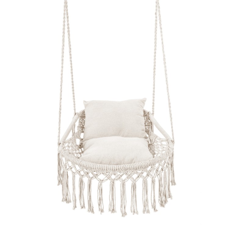 Macrame swing chair hammock in beige with two removable cushions, featuring chic fringes for indoor or outdoor use.