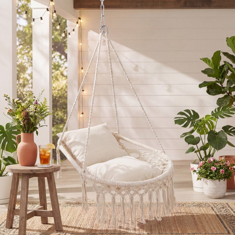Macrame swing chair hammock in beige with removable cushions, featuring a chic bohemian style for indoor or outdoor use.