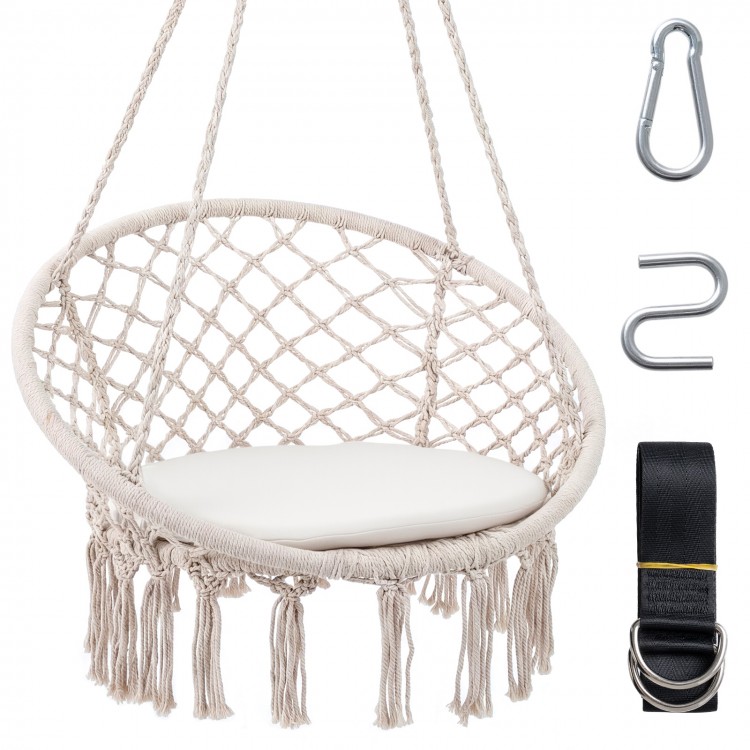 Macrame swing chair in beige with round seat cushion, featuring decorative fringes and sturdy metal frame for comfort.