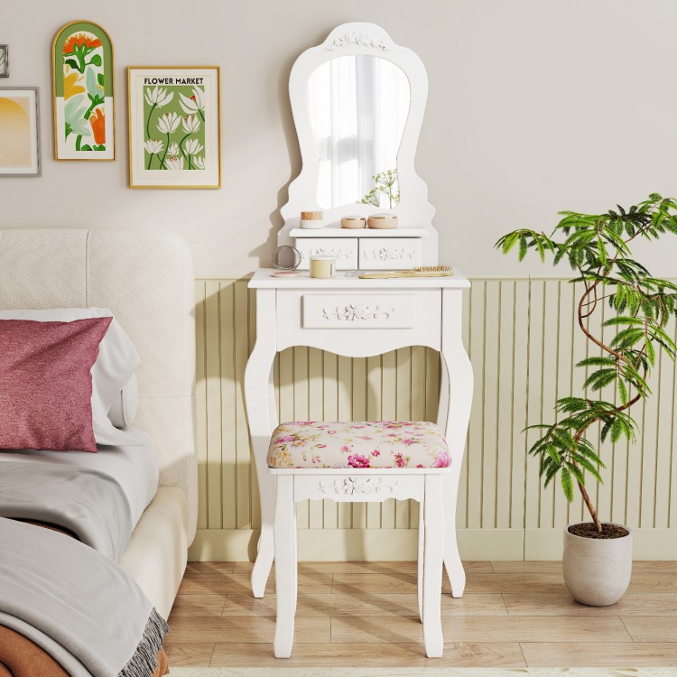 White makeup dressing table with fan-shaped mirror, cushioned stool, and three drawers for storage in a stylish bedroom.