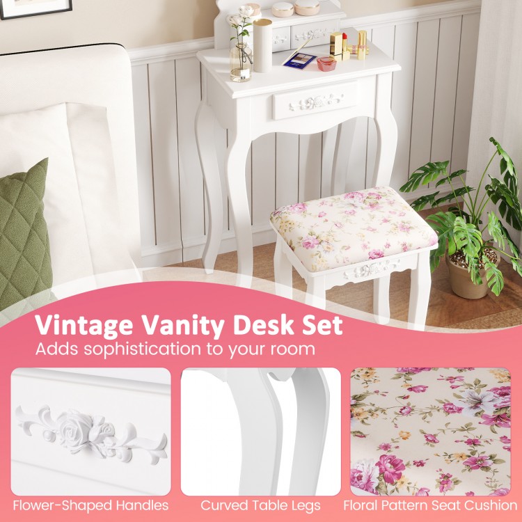 Vintage vanity desk set featuring a floral pattern seat cushion, curved legs, and flower-shaped handles for elegant.