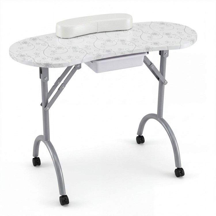 Foldable portable manicure table with a spacious desktop, drawer, and comfy wrist cushion, ideal for nail beauticians.