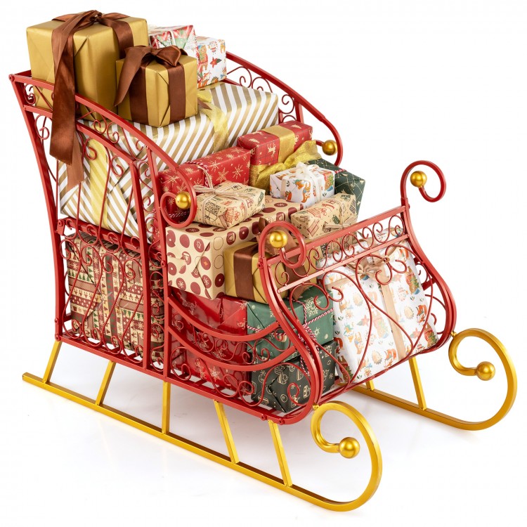 Metal Christmas Santa sleigh basket with gifts, featuring a red frame and golden base, perfect for holiday storage.