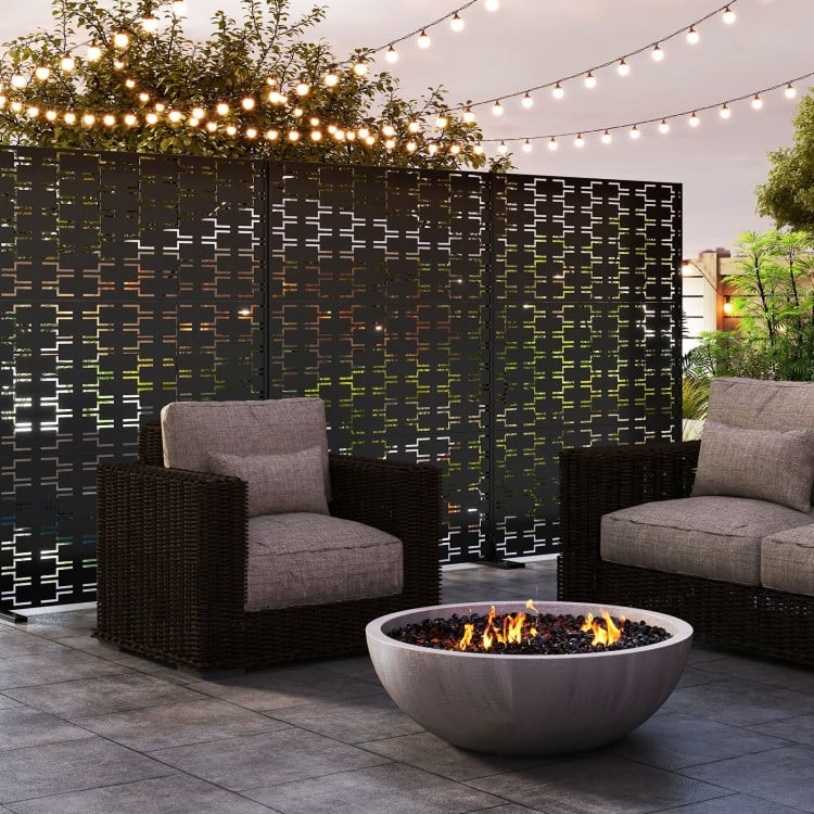 Freestanding black metal privacy screen with hollowed design, ideal for outdoor spaces and climbing plants.