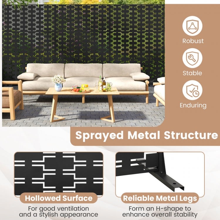 Freestanding black metal privacy screen with hollowed surface and H-shaped legs for outdoor and indoor use.