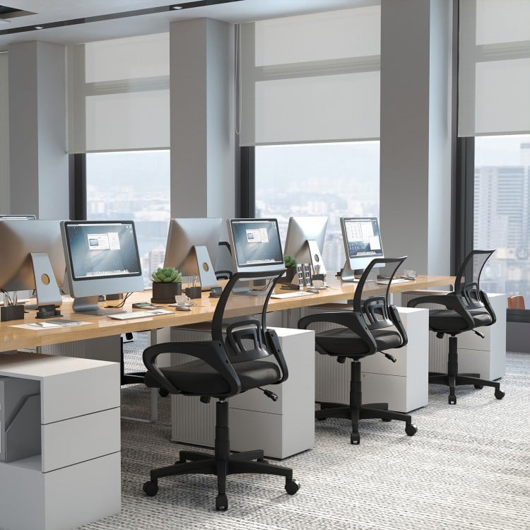 Mid-back mesh office chair in black with lumbar support, designed for ergonomic comfort in modern office settings.
