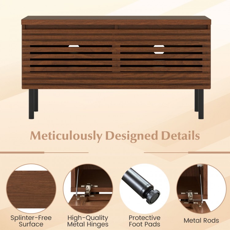 Mid Century fluted TV stand in walnut with metal legs, featuring hidden compartments for organized storage.