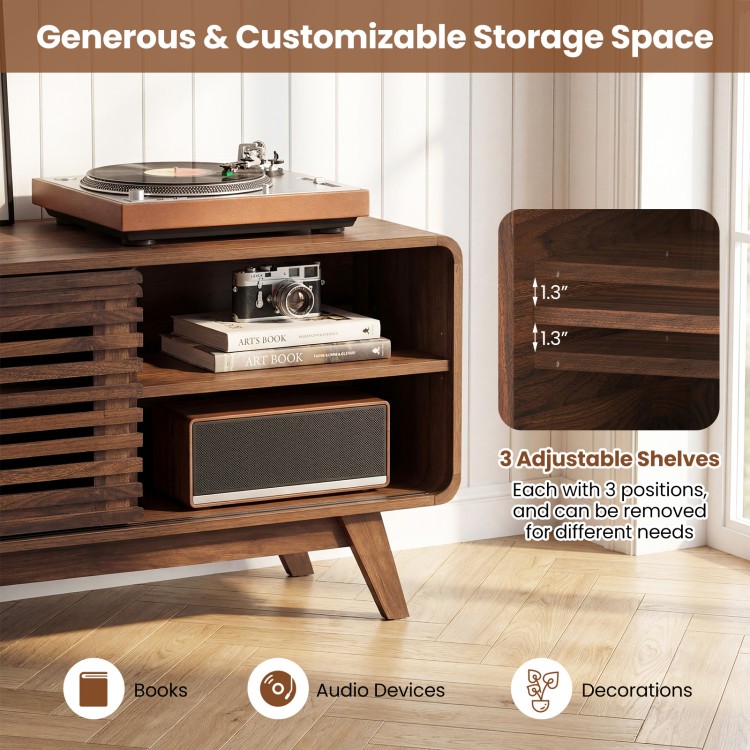Mid-century modern entertainment center in walnut with adjustable shelves, perfect for books and audio devices.