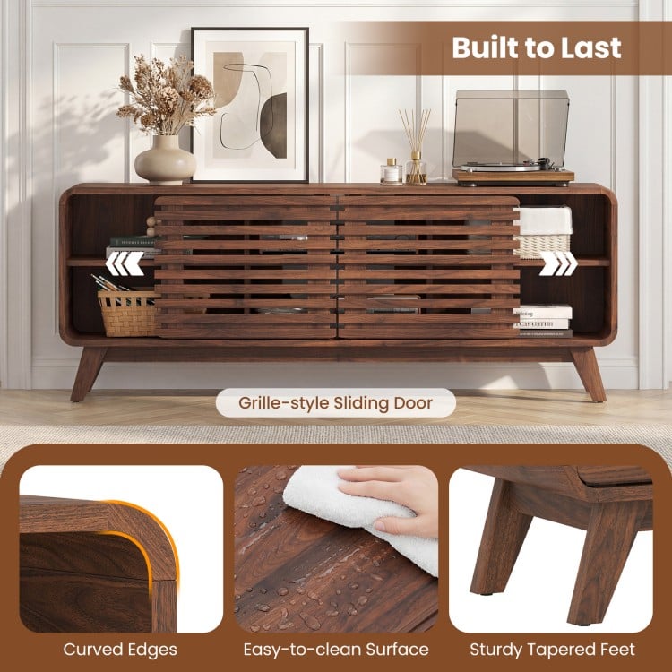 Mid-century modern entertainment center in walnut with grille-style sliding doors and sturdy tapered feet for stylish.