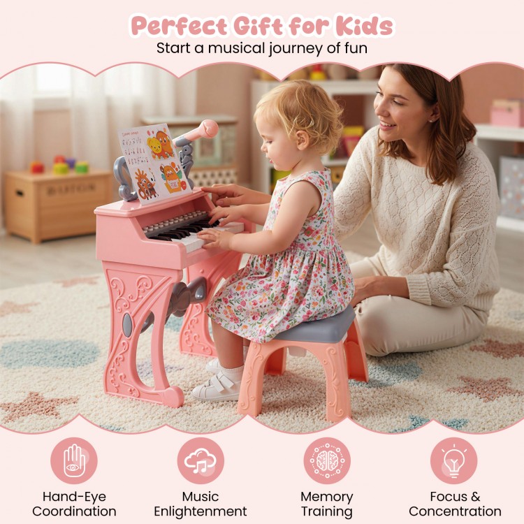 Mini keyboard piano for kids in pink with 25 keys, matching stool, and music stand for toddlers' musical fun.