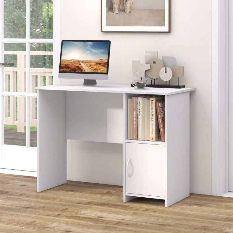 Modern white computer desk featuring an open shelf and cabinet, ideal for study or office use with cable management.