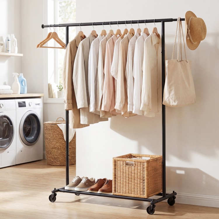 Mobile garment rack with lower bars for bins and luggage, featuring a stable metal frame and smooth-rolling wheels.