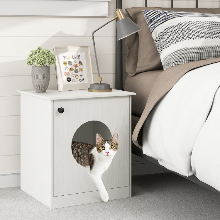 Modern cat litter box enclosure in white with a cat emerging from the side, perfect for stylish pet-friendly spaces.