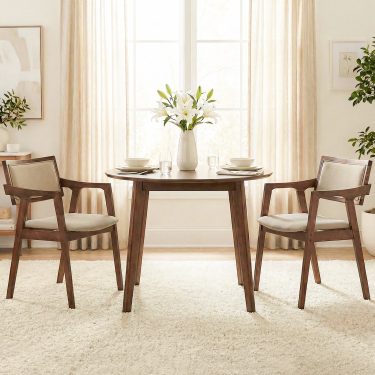 Beige upholstered dining chairs with arms, featuring a solid rubber wood frame, perfect for modern dining spaces.