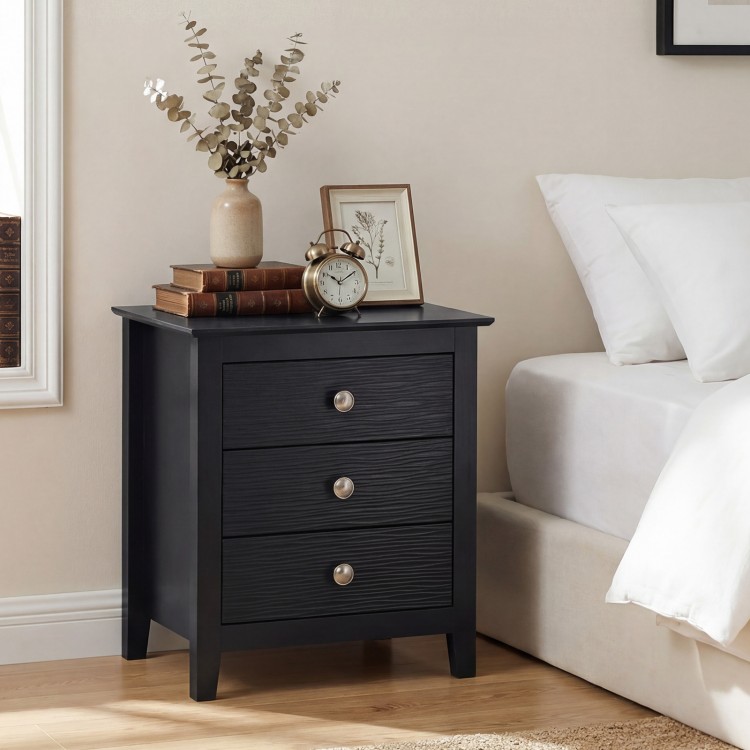 Black 3-drawer nightstand with wood grain accents and sleek knobs, perfect for bedside storage and decor.