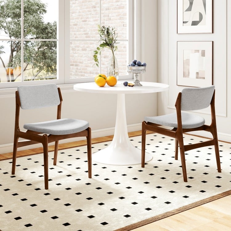 Modern padded dining chairs set of 2 with rubber wood legs, featuring gray linen fabric and a stylish farmhouse design.