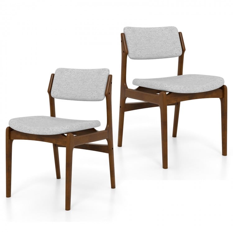 Set of 2 modern padded dining chairs with rubber wood legs, featuring soft cushions and a stylish farmhouse design.