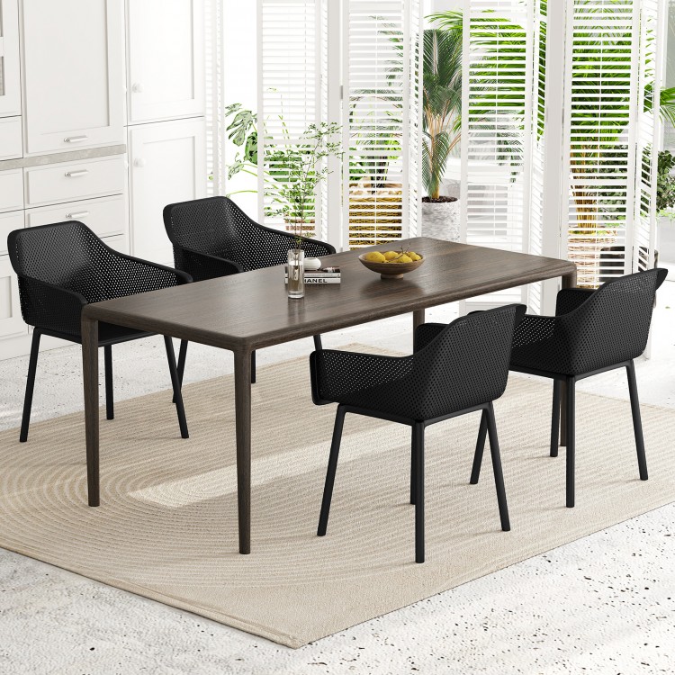 Set of 4 black ergonomic dining chairs with breathable mesh backrest, perfect for modern dining rooms or kitchens.