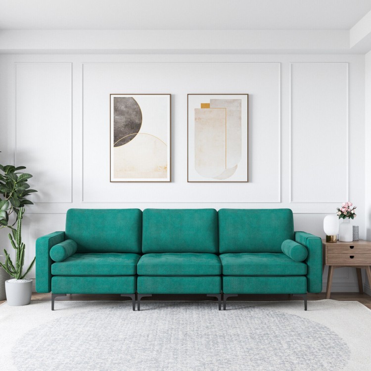 Three-seat modular L-shaped sectional sofa in peacock blue suede, featuring USB port and ergonomic support for comfort.