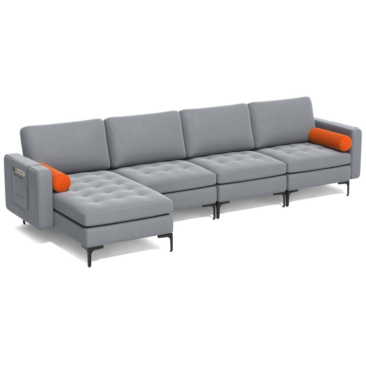 Modular L-shaped sectional sofa in gray featuring a reversible chaise, steel backrest with USB ports, and side bolsters.