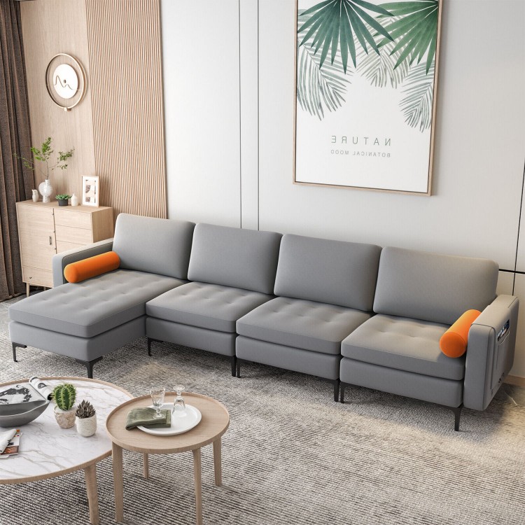Modular L-shaped 4-seat sectional sofa in gray with reversible chaise, USB sockets, and soft back pillows for comfort.