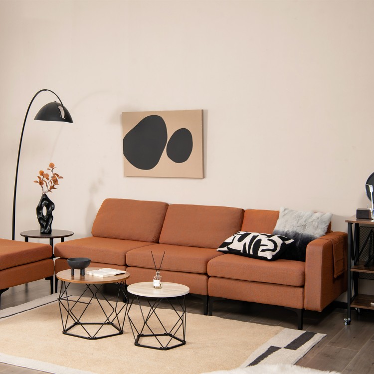 Modular L-shaped sectional sofa in orange with removable ottoman, featuring USB ports and ergonomic cushions for.