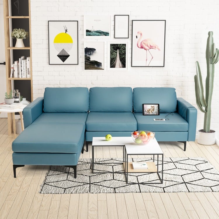 L-shaped blue sectional sofa with reversible chaise, USB ports, and armrest organizer for modern living rooms.