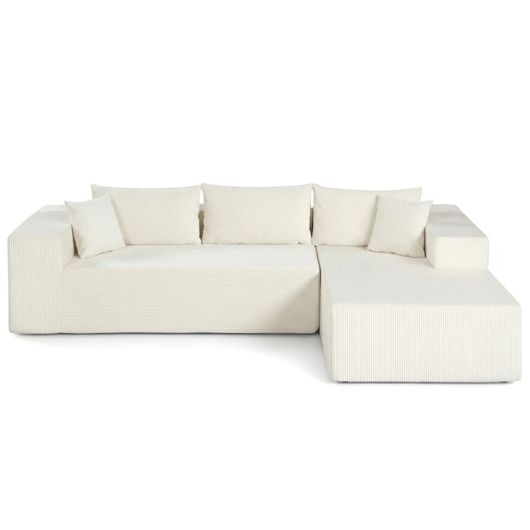 Modular L-shaped sectional sofa in beige corduroy with deep seats, supportive backrests, and easy-to-clean zippered.