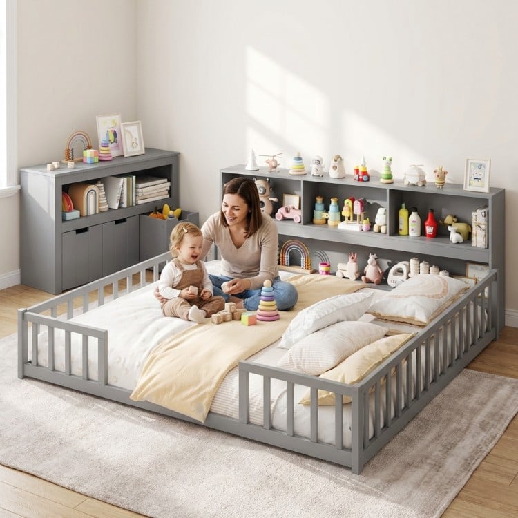 Montessori twin floor bed with matching gray toy storage cabinet, promoting independence and organization in kids'.