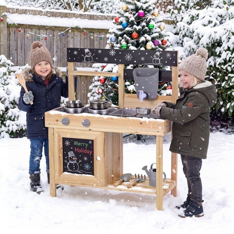 Kids playing with the Mud Kitchen Playset featuring removable sinks and stoves, perfect for outdoor imaginative cooking.