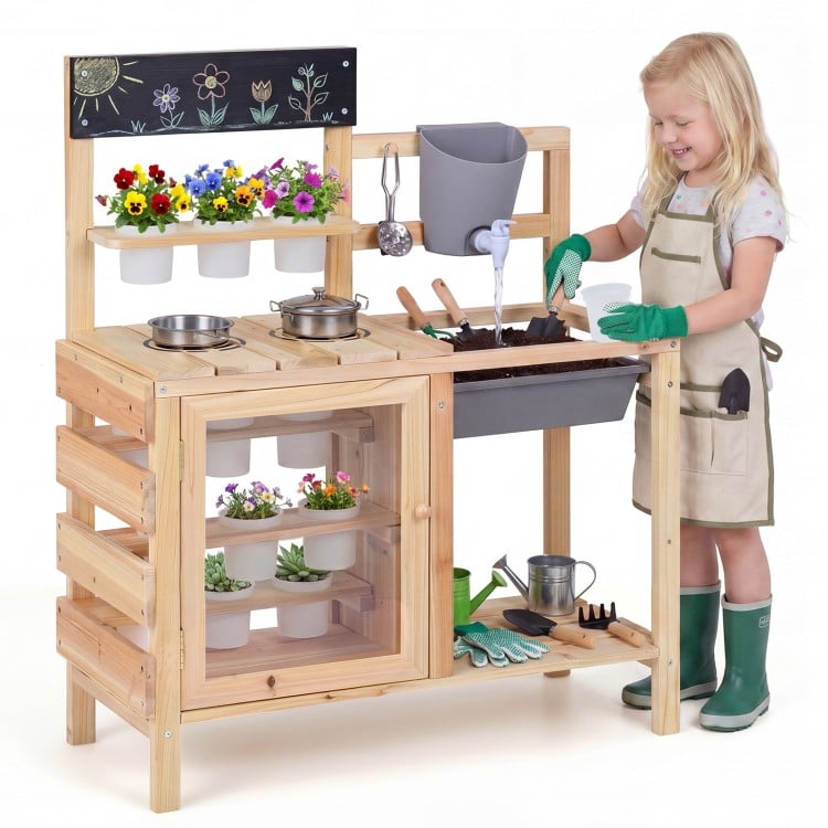Mud kitchen playset with sink, plant cups, and stainless steel kitchenware for outdoor play and gardening fun.