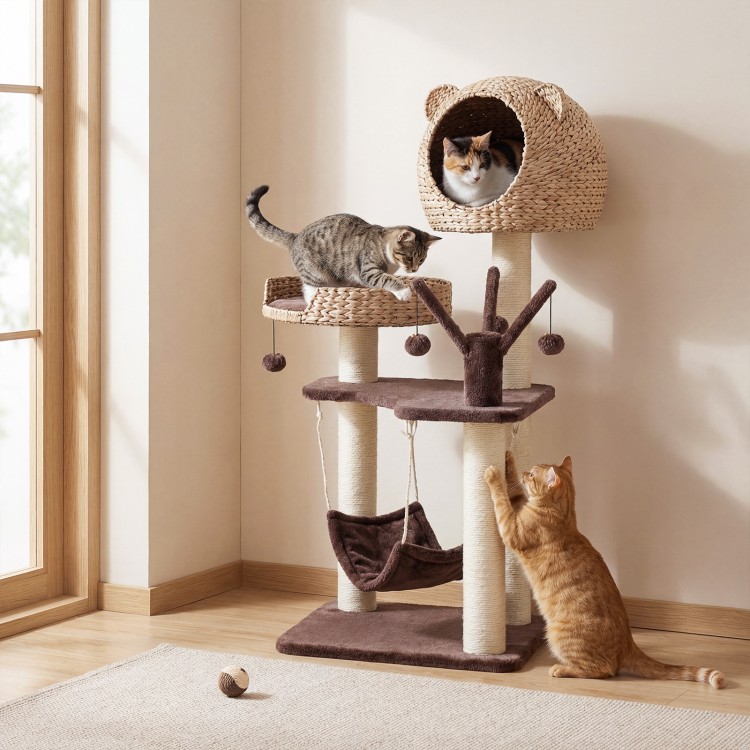 Multi-level cat tree in brown featuring a cozy condo, soft hammock, and playful hanging balls for climbing and napping.