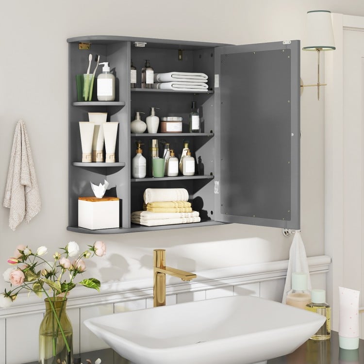 Gray bathroom cabinet with adjustable shelves and a mirrored door, perfect for organizing essentials in compact spaces.