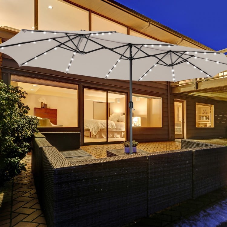 15 feet double-sided patio umbrella in beige with 48 LED lights, perfect for spacious outdoor shading and relaxation.