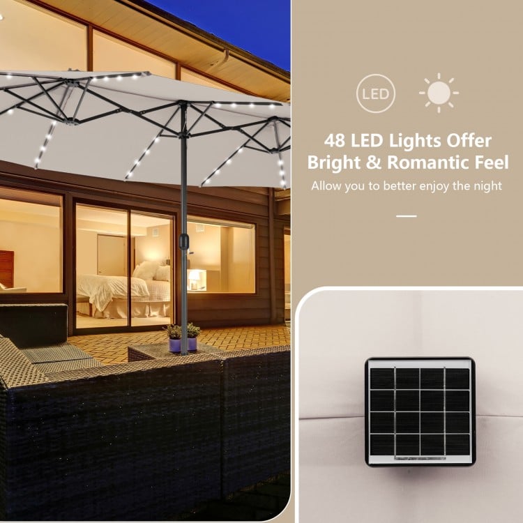 Double-sided 15 feet patio umbrella in beige with 48 LED lights, perfect for outdoor shading and evening ambiance.