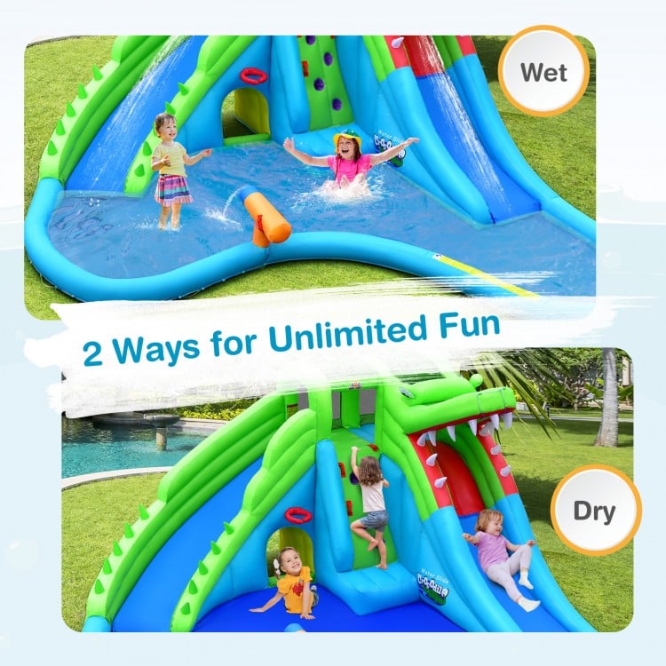 Inflatable bounce house with water slide and splashing pool, featuring double slides and climbing wall for outdoor fun.
