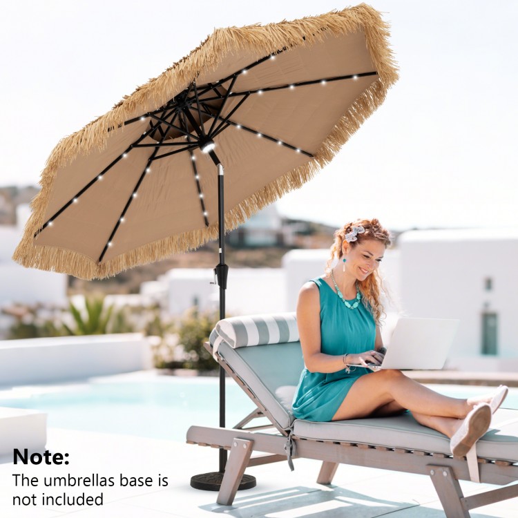 9-foot thatched tiki patio umbrella with LED lights, showcasing a tropical style for outdoor relaxation by the pool.
