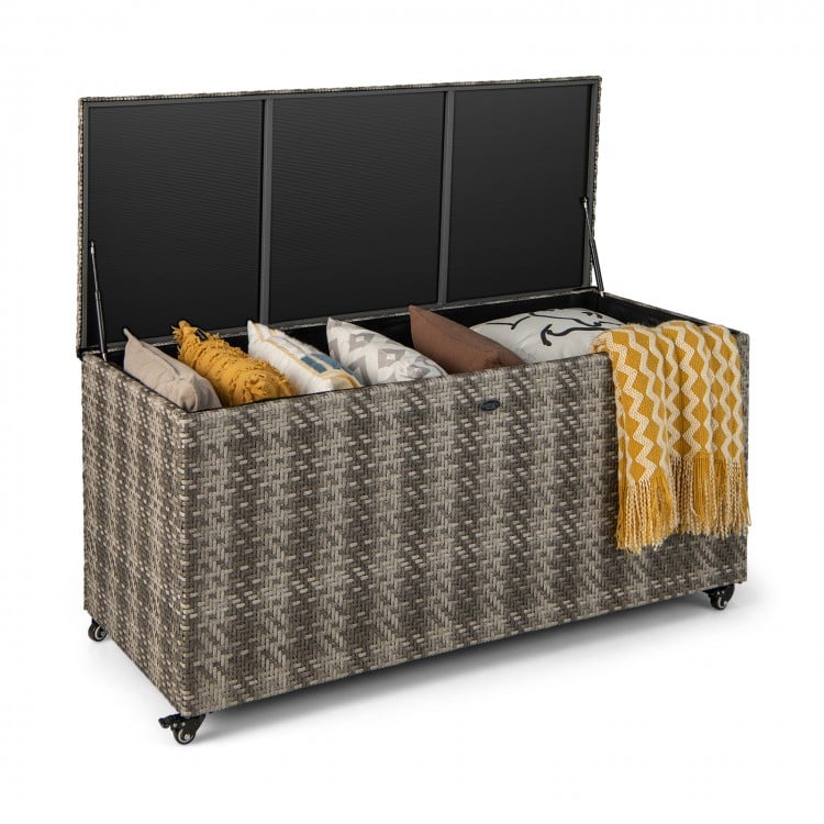 Gray 96-gallon PE wicker outdoor storage box with wheels, featuring a hydraulic lid, ideal for cushions and blankets.
