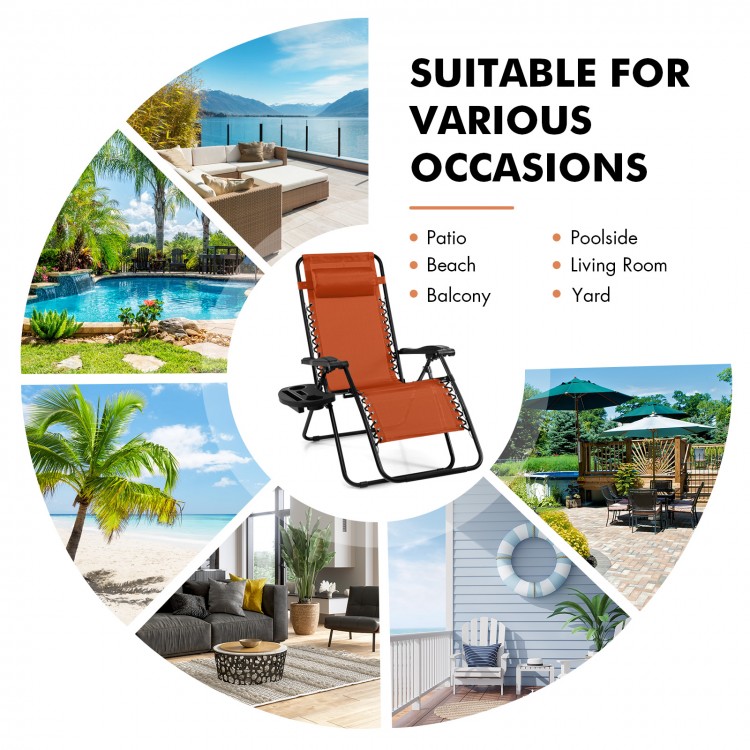 Outdoor folding zero gravity reclining lounge chair in orange, perfect for patio, beach, or poolside relaxation.