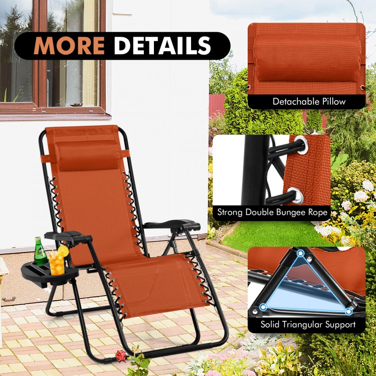 Orange outdoor folding zero gravity reclining lounge chair with detachable pillow and cup holder for relaxation.