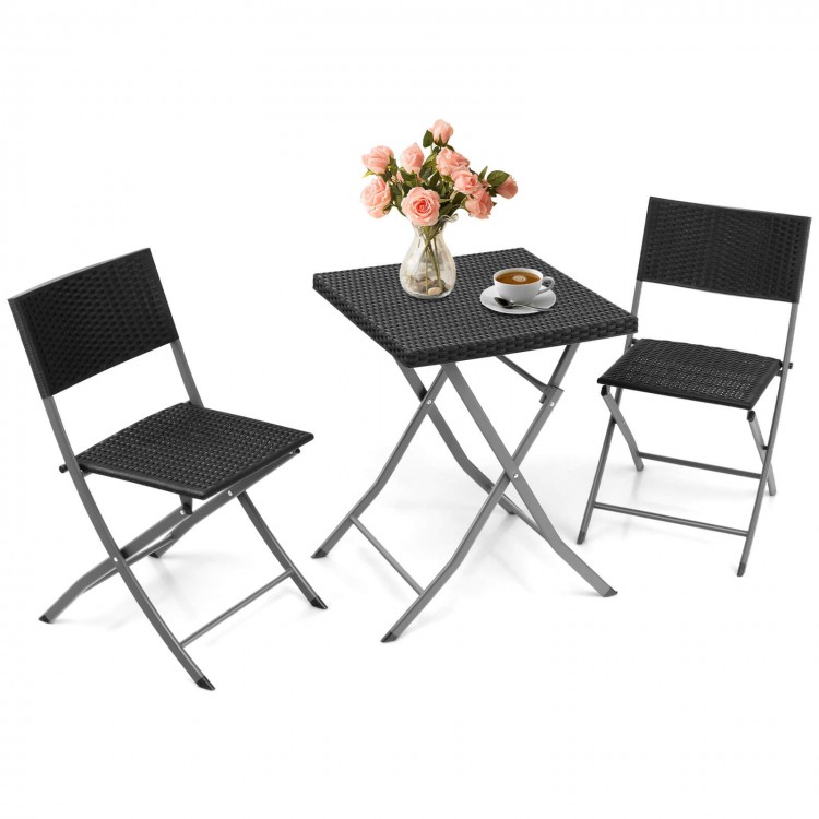 Black 3-piece patio bistro set featuring folding wicker chairs and table, perfect for outdoor relaxation.