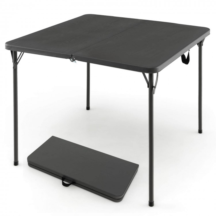 Folding camping table with gray HDPE tabletop and rustproof steel frame, perfect for outdoor use and easy to carry.