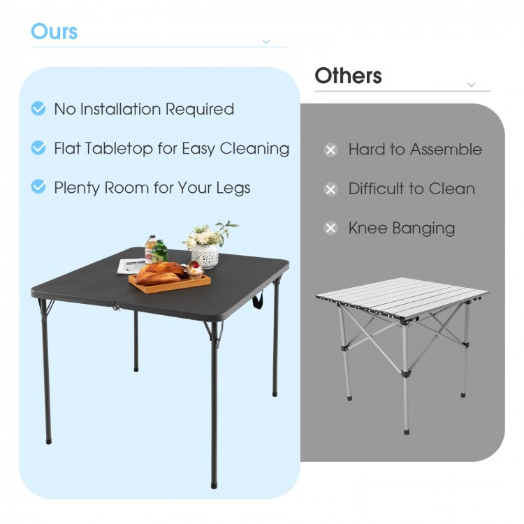 Folding camping table with gray HDPE tabletop and rustproof steel frame, designed for easy cleaning and outdoor use.
