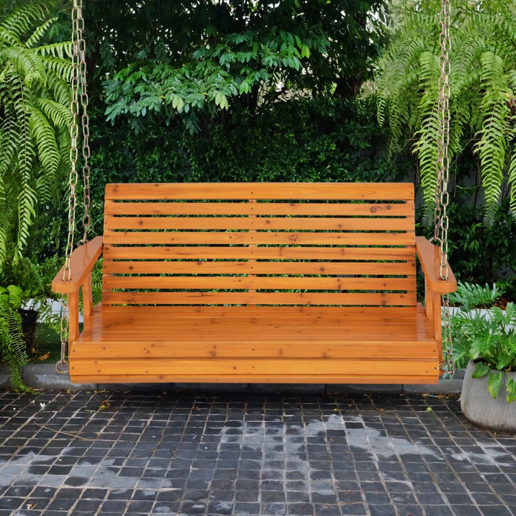 Two-person wooden porch swing with hanging chains, waterproof design, for garden relaxation and outdoor comfort.