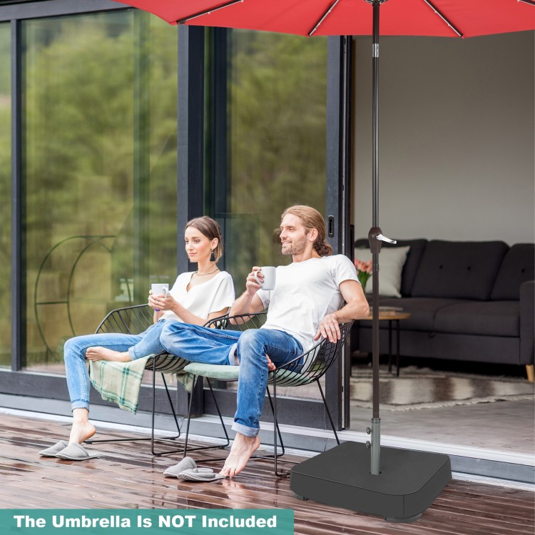 Square umbrella base with two sandbags, sturdy metal frame, and dust-proof cover for outdoor umbrella stability.