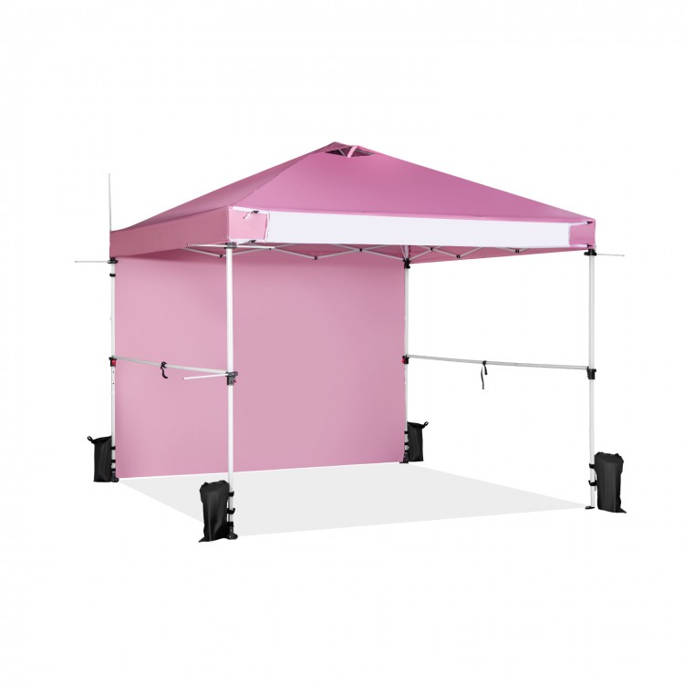 Foldable pink pop-up canopy with adjustable height, ideal for outdoor events, featuring a portable roller bag.