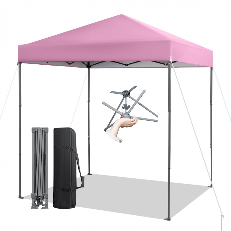 Pink outdoor pop-up canopy tent with UPF 50+ sun protection, featuring a heavy-duty frame and adjustable height for.