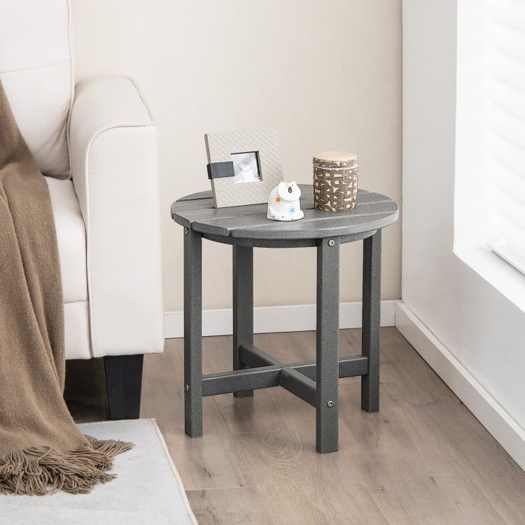 Gray 18-inch round weather-resistant Adirondack side table with slatted top, perfect for outdoor or bathroom use.