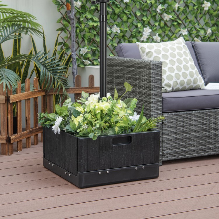Fillable black umbrella base with planter box, featuring a large tabletop and drainage hole for outdoor use.